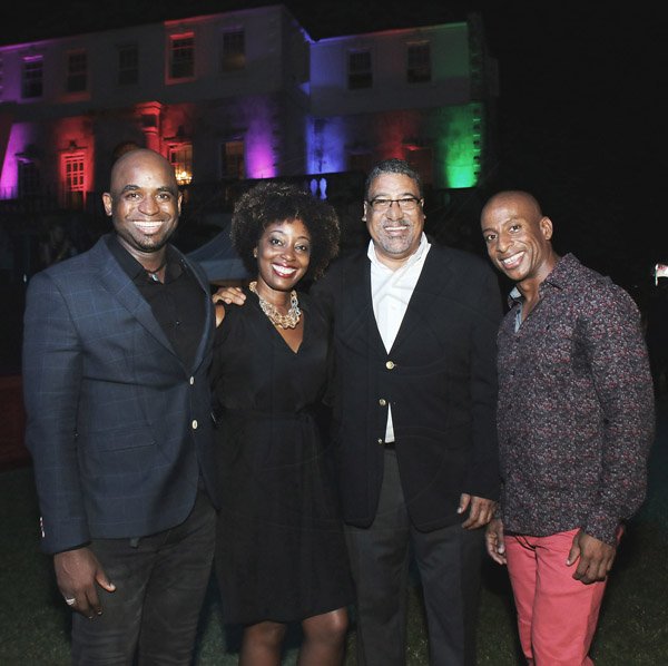 Starting from left- Robert Headley (Chairman of JHTA) poses with Nadine Spence (SixT Car Rentals) MP Dr.  Wykeham McNeil, and Omar Robinson (President of JHTA)<\n> *** Local Caption *** @Normal:From left: Robert Headley, chairman of Jamaica Hotel and Tourist Association (JHTA); Nadine Spence of SixT Car Rentals; Member of Parliament Dr Wykeham McNeill; and Omar Robinson, president of the JHTA.
