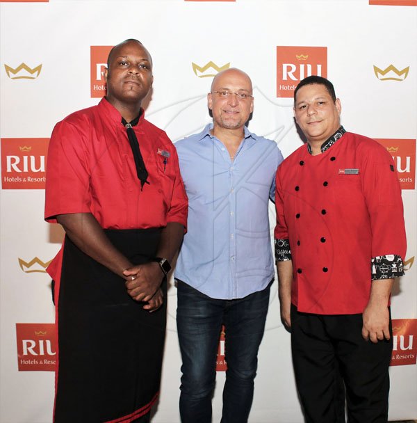 Ashley Anguin<\n>From left- Oneil Vernon, executive chef RIU Palace; Frank Sondern, general manager RIU Hotels and Resorts; and Henry Bernard executive chef RIU Reggae.<\n> *** Local Caption *** @Normal:From left: Oneil Vernon, executive chef, RIU Palace; Frank Sondern, general manager, RIU Hotels and Resorts; and Henry Bernard, executive chef, RIU Reggae.