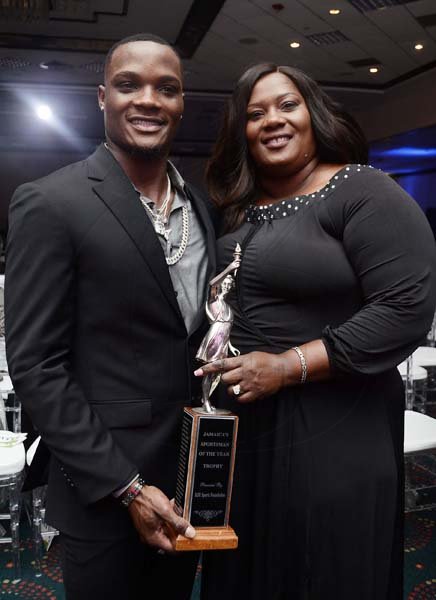 KenyonHemans/PhotographerThe RJRGLEANER Sportsman of the year Omar McLeod, shares the award with his mother Arnella Morris.