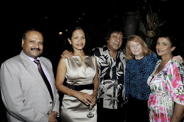Winston Sill / Freelance Photographer
Kenny Benjamin host the American Friends of Jamaica (AFJ) at Dinner, held at Montgomery Road, Stony Hill on Tuesday night April 16, 2013. Here are Pratap Singh (left), Indian High Commissioer; Aloima Suarez (second left); Kenny Benjamin (centre); Laura Tanna (second right); and Valerie Juggan-Brown (right).