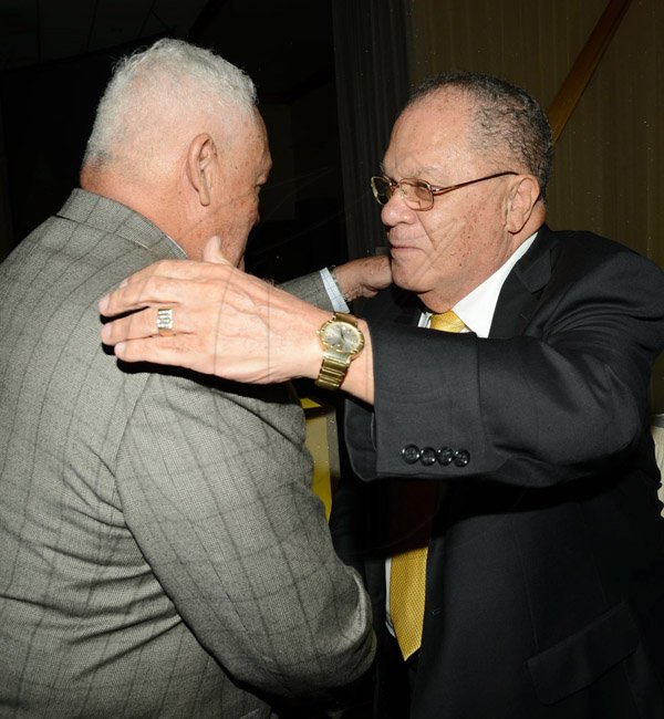 Rudolph Brown/Photographer
Mick Henry greets Arnold Foote Founder of Advertising and Marketing at Admark 50th Anniversary Banquet at the Jamaica Pegasus on Tuesday, April 14