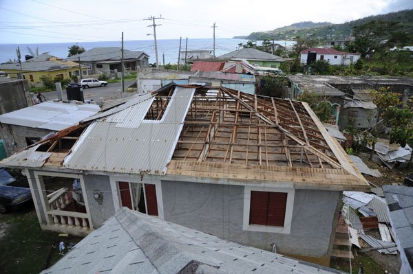 Ricardo Makyn/Staff Photographer 
 The Home of Desmond Patterson in Long Bay Portland that the Roof was taken off by the winds associated with Hurricane Sandy