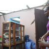 Ricardo Makyn/Staff Photographer 
 Alashia Parker with Daughter Calecia Gibson in thier Home that is now roofless in    Manchioneal Portland  due to  the passage of  the Hurricane Sandy