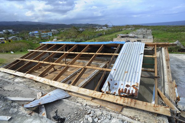 Ricardo Makyn/Staff Photographer 
 House's affected by the winds from Sandy in  Sandshore   Manchioneal Portland  due to  the passage of  the Hurricane