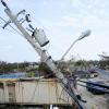 Ricardo Makyn/Staff Photographer 
Collapsed Light Poles in  Manchioneal Portland  after  the passage of Hurricane Sandy