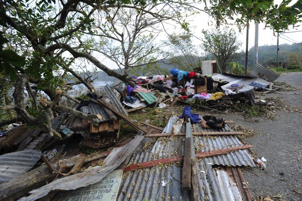 Ricardo Makyn/Staff Photographer 
what was the home of Corena Stewart of Grange Hill Portland  after the passage of Hurricane Sandy