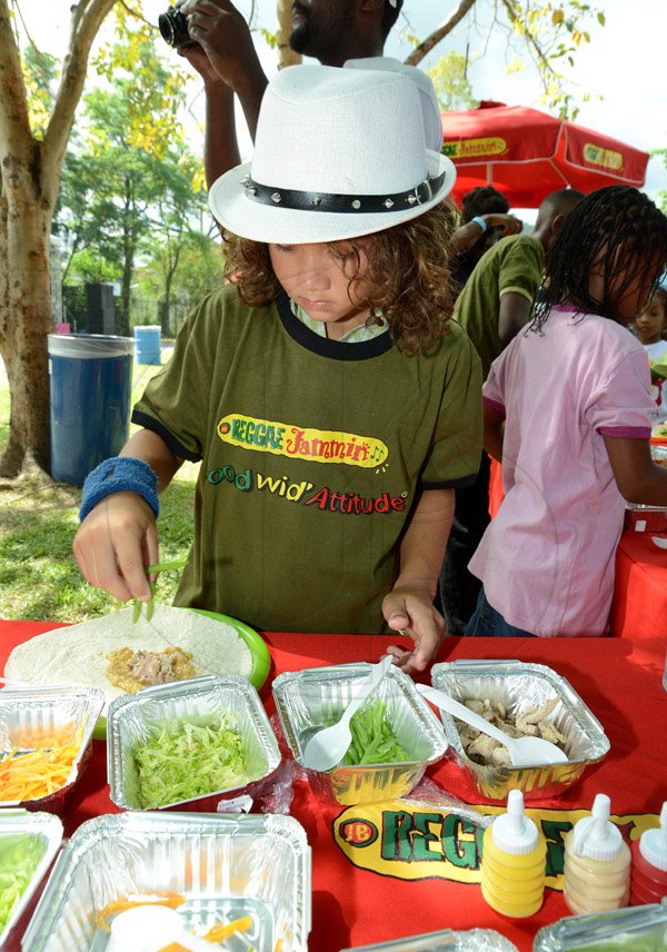 Rudolph Brown/Photographer
Mini Chefs Jai David Mair contest the Reggae Jammin Kids Grill-Off at All Jamaica Grill Off at Hope Gardens on Sunday, June 9, 2013