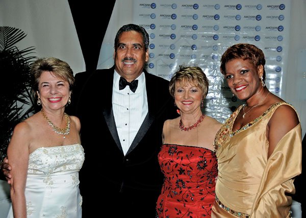Winston Sill / Freelance Photographer
The AMCHAM Business and Civic Leadership Awards Gala anmd Presentation, held at the Jamaica Pegasus Hotel, New Kingston on Monday night September 26, 2011. Here are Diana Stewart (left); Jerome Maxwell (second left); Becky Stockhausen (second right); and Michelle Wilson-Reynolds (right).