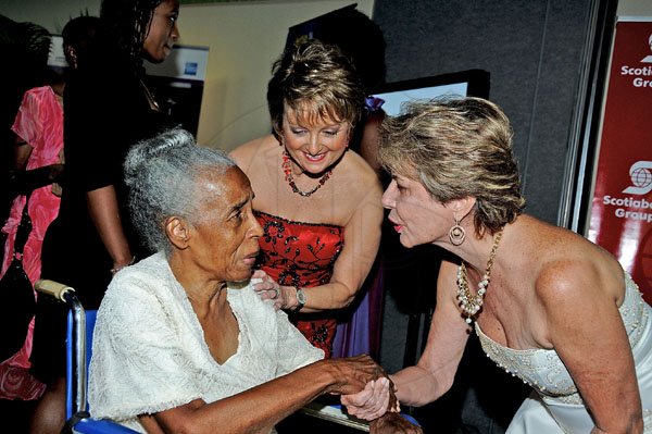 Winston Sill / Freelance Photographer
Dr Olive Lewin (left) is greeted by Becky Stockhausen (centre); and Diana Stewart.

*************************************************************************** (right).The AMCHAM Business and Civic Leadership Awards Gala anmd Presentation, held at the Jamaica Pegasus Hotel, New Kingston on Monday night September 26, 2011. Here are Dr. Olive Lewin (left); Becky Stockhausen (centre); and Diana Stewart (right).