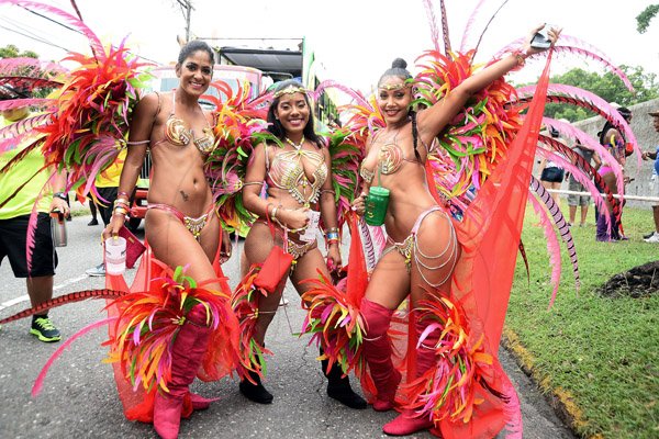 Patrick Planter/ PhotographerGal pals (from left) Renee Rickhi, Francisca Griffiths and Brianna Reynolds are seen 'wining like they're single' on Bacchanal Jamaica Road March. Bacchanal Jamaica Road March on Sunday April 23, 2017 at 9:00am