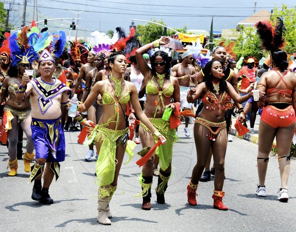 Winston Sill / Freelance Photographer
Revellers brave the sun during Bacchanal Jamaica Carnival Road Parade on Sunday.








, held on Sunday May 1, 2011.
