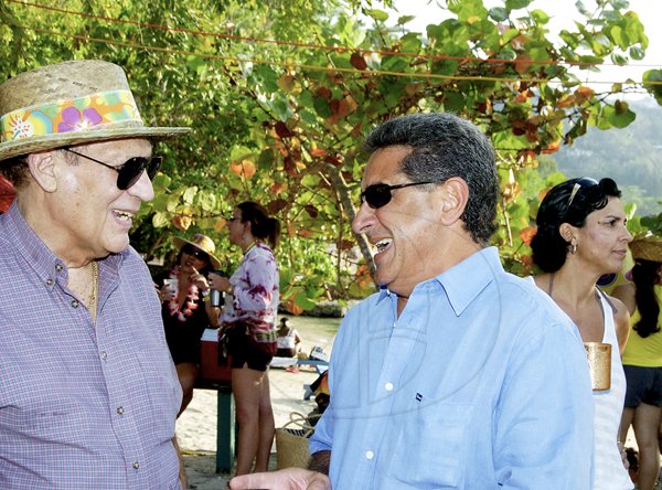 Winston Sill / Freelance Photographer
Bacchanal Jamaica and Smirnoff Beach J'ouvert, featuring Machel Montano and Patrice Roberts, held at James Bond Beach, Oracabessa, St Mary on Saturday April 7, 2012. Here are Michael Ammar Sr. (left); and Gassan Azan (right).