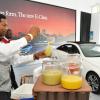 Jermaine Barnaby/Photographer
David Gordon waiter serves drinks at The New E-Class Sedan launched on Monday, September 9, 2013 Silver Star Motors Limited, South Camp Rd, Kingston.