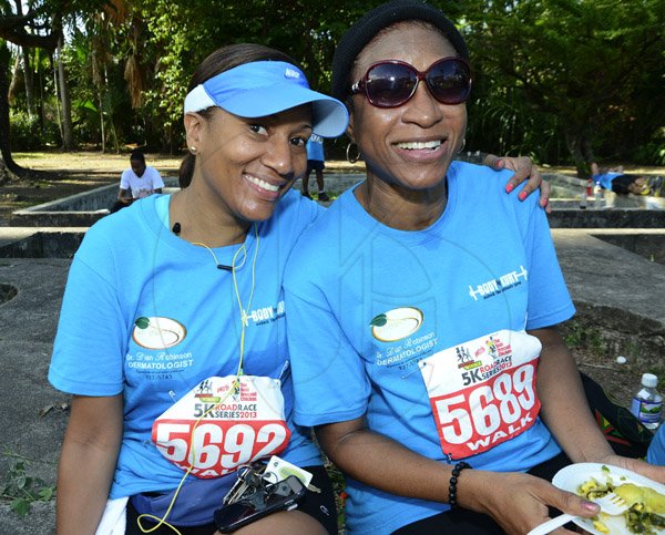 Rudolph Brown/Photographer
Bev Cole, (right) pose with Jamelia DePeralto at the Best Dressed Chicken 5K Road Race Series 2013 at Hope Garden on Sunday, March 24, 2013.