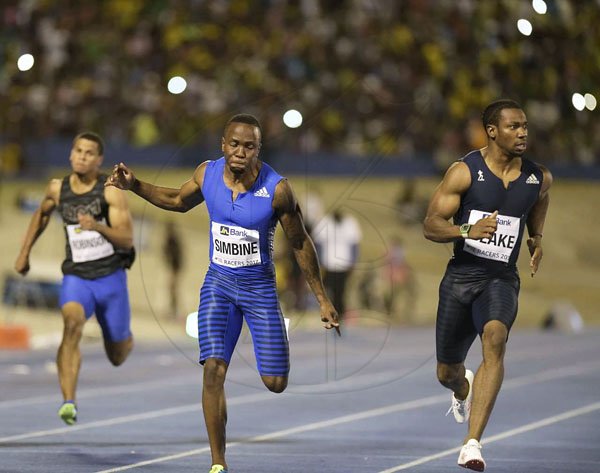 Gladstone Taylor/Photographer

Jamaica's Yohan Blake wins the men's 100m sprint in 9.97 seconds ahead of South African Akani Simbine, second in 10.00 seconds, and Trinidad and Tobago's Keston Bledman, third in 10.22 seconds at the JN Racers Grand Prix at the National Stadium on Saturday June 10, 2017. *** Local Caption *** Gladstone Taylor/Photographer

Jamaica's Yohan Blake (right) wins the men's 100m sprint in 9.97 seconds ahead of South African Akani Simbine (center), second in 10.00 seconds, and Trinidad and Tobago's Keston Bledman, third in 10.22 seconds at the JN Racers Grand Prix at the National Stadium on Saturday night.