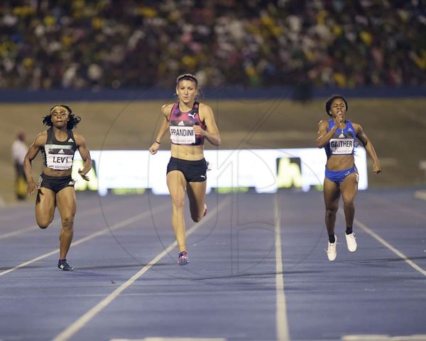 Gladstone Taylor/Photographer

USA's Jenna Prandini wins the Women's 200m sprint at the JN Racers Grand Prix in a time of 22.57 at the National Stadium on Saturday June 10, 2017. Jamaica's Jura Levy (left) was fifth in 22.99 seconds. Also seen in this photo is Bahamas' Tynia Gaither, who finished sixth.  *** Local Caption *** Gladstone Taylor/Photographer

USA's Jenna Prandini wins the Women's 200m sprint at the JN Racers Grand Prix in a time of 22.57 at the National Stadium on Saturday night. Jamaica's Jura Levy (left) was fifth in 22.99 seconds. Also seen in this photo is Bahamas' Tynia Gaither, who finished sixth.
