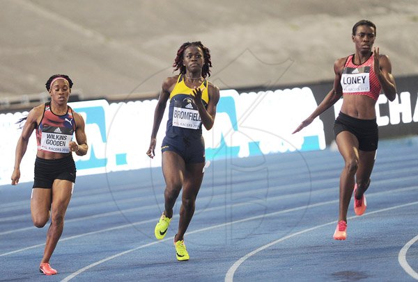 x *** Local Caption *** Ricardo Makyn/PhotographerJamaica's Dawna-Lee Loney (right) winner of the  women's 400m 'A' race at the JN Racers Grand Prix at the National Stadium last night. Loney won in 52.05 seconds ahead of compatriots Junelle Bromfield (52.08) and Bobby-Gaye Wilkins, 52.20.