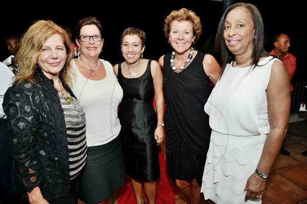 Rudolph Brown/Photographer
New President of Scotiabank Jacqueline Sharp (centre) comes full circle with  these other lovely ladies (from left) Alberta Cefis, Exective Vp and Head Global Transaction Banking, Marianne Hasold-Schilter, Exective VP and Chief Administrative Officer Scotia International Banking, Chairwoman of the Bank's board, Sylvia Chrominska and Barbara Alexander, Director Scotia group.