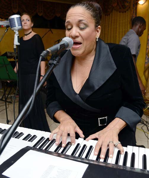 Rudolph Brown/Photographer
Singer Susan Couch at the keyboard
performs at the Calabar Old Boys Annual Reunion Dinner at the Mona Visitors Lodge on Saturday, October 5, 2013