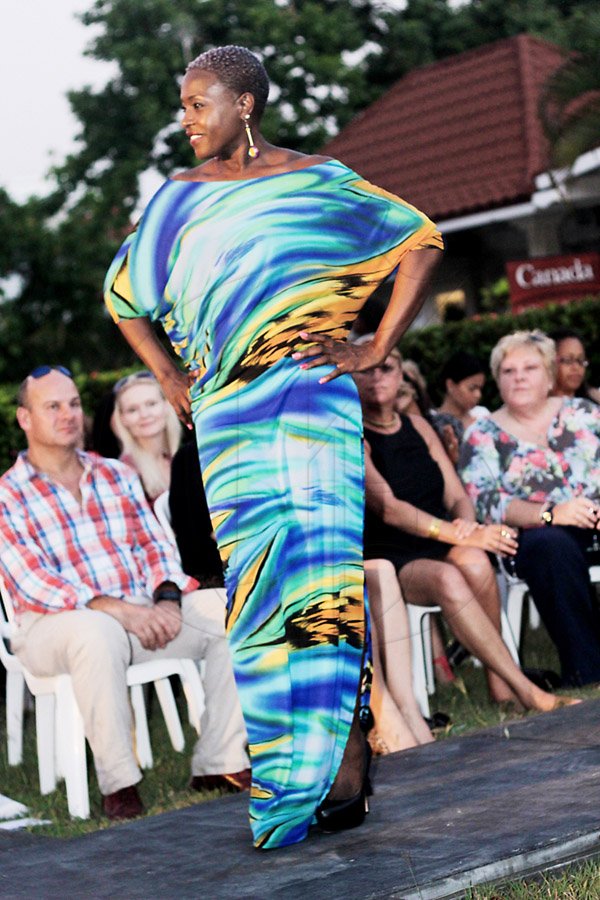 Barbara Grant wears a lovely tropical Elan Fashions design by Heather Lane