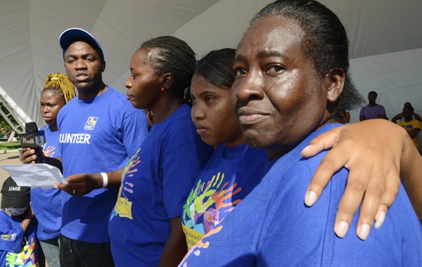 Rudolph Brown/Photographer
Roger Cogle, Market Head, Personal Banking at RBC Royal Bank (Jamaica) speaks at the RBC Royal Bank Caribbean Children's Cancer Fund, " A Mile for a Child" join with family and friends participate in a charity walk and a fun class of Zumba and aerobics session at the Emancipation Park in New Kingston on Saturday, September 8-2012