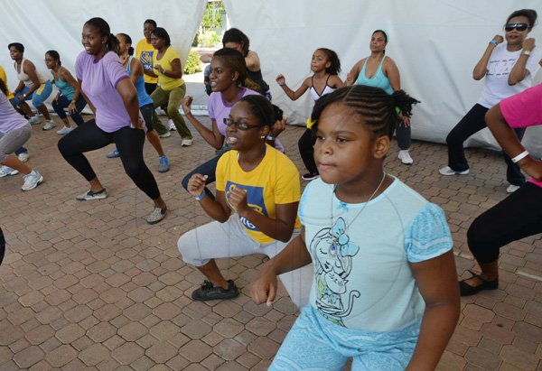 Rudolph Brown/Photographer
RRBC Royal Bank Caribbean Children's Cancer Fund, " A Mile for a Child" join with family and friends participate in a charity walk and a fun class of Zumba and aerobics session at the Emancipation Park in New Kingston on Saturday, September 8-2012