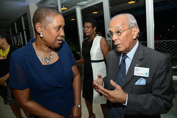 Rudolph Brown/Photographer
Dennis Lolar, Board Director chat with Iva Glouden Ambassador of Trinidad and Tobago to Jamaica at the Caribbean Airlines awards and Corporate Event at the Jamaica Pegasus Hotel on Friday, November 15, 2013