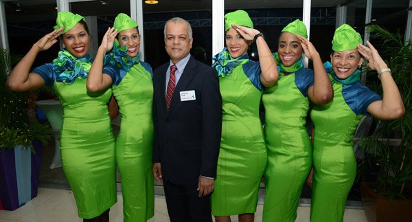 Rudolph Brown/Photographer
Jagmohan Singh, Acting CEO of Caribbean Airline pose with Caribbean Airline hostesses from left Marsha-Gaye Greaves, Laila Bennett, Onika McGan, Soliann Pinnock and Paul-Ann Lee-Smith at the Caribbean Airlines awards and Corporate Event at the Jamaica Pegasus Hotel on Friday, November 15, 2013