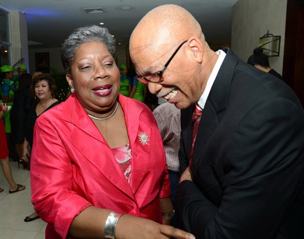 Rudolph Brown/Photographer
Carol Guntley, director general in the Ministry of Tourism chat with Oral McCook, Managing Director OGM Communication at the Caribbean Airlines awards and Corporate Event at the Jamaica Pegasus Hotel on Friday, November 15, 2013