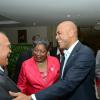 Rudolph Brown/Photographer
Haitian President H.E. Michel Martelly, (second right) greets Dennis Lolar,(left) Board Director, Carol Guntley, director general in the Ministry of Tourism and Jagmohan Singh, (right) Acting CEO of Caribbean Airline  at the Caribbean Airlines awards and Corporate Event at the Jamaica Pegasus Hotel on Friday, November 15, 2013
