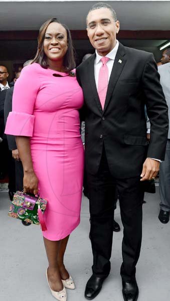 KenyonHemans/Photographer<\n>The Opening of ParliamentKenyonHemans/Photographer<\n>Prime Minister Andrew Holness and his wife Juliet decided to colour-coordinate for the ceremonial opening of Parliament.
