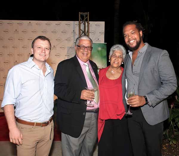 Ashley Anguin<\n>The discerning palates of from left: Max Jardim, business development manager at RainForest Seafoods; Winston Dear of Baypointe Vacation Apartments his wife Denise and Rory Frankson came out to sample Lambert's creations.  *** Local Caption *** @Normal:From left: Max Jardim, business development manager at Rainforest Seafoods; Winston Dear of Baypointe Vacation Apartments his wife Denise and Rory Frankson came out to sample Lambert's creations.