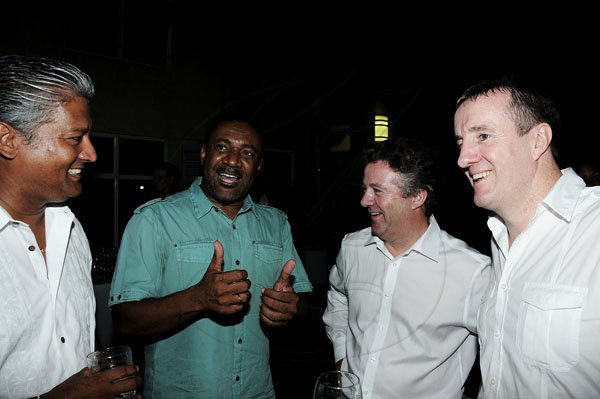 Winston Sill / Freelance Photogra
Chester Francis Jackson Birthday Party, held at Spanish Court Hotel, St. Lucia Avenue, New Kingston on Sunday  night August 26, 2012. Here are Nari William-Singh (left); Minister Phillip Paulwell (second left); Andy Thorburn (second right), CEO, Digicel Jamaica; and Mark Linehan (right), outgoing CEO, Digicel Jamaica.