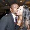 Contributed

Chairman and founder of Children Of Jamaica Outreach (COJO) Gary Williams, steals a kiss from Sabrina Hosang at the COJO Gala on December 3.