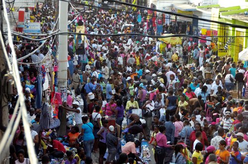 Norman Grindley/Chief Photographer
The massive crowd that turned out to shop for Christmas during 'Dowtown Comes Alive, Christmas in the City' on Beckford Street, downtown Kingston yesterday.