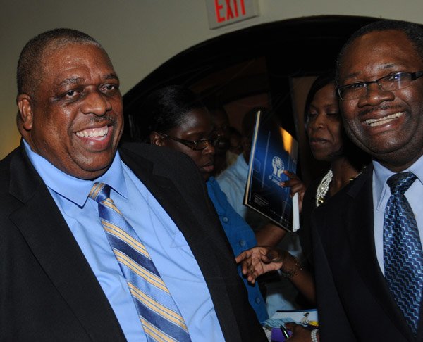 Winston Sill/Freelance Photographer
BUSINESS DESK:----C&WJ Co-operative Credit Union Limited 49th Annual General Meeting, held at the Jamaica Pegasus Hotel, New Kingston on Tuesday evening May 14, 2013. Here are David Hall (left), President; and Barrington Whyte (right), General Manager.