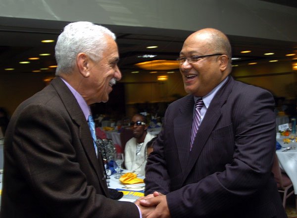 Peta-Gaye Clachar/Staff Photographer
Major Richard Reese (right) Commissioner of corrections greets guest speaker Senator the Honourable Colonell Trevor MacMillan at the Department of correctional services awards dinner at the Hilton Hotel in Kingston on Tuesday, October 28, 2008.