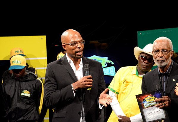 Winston Sill/Freelance Photographer
J Wray and Nephew presents the Wray and Nephew White Overproof Rum Contender 2014 Season Launch, held at TVJ Studios, Lyndhurst Road on Thursday night March 13, 2014. Here are Stephen Jones? (centre), President, Jamaica Boxing Board; Andrew Boland (second right), Coach, Yellow Team; and Leroy Brown (right).