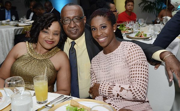 Rudolph Brown/Photographer
Shelly Ann Fraser Pryce, (right) pose with Pete Forrest, Senior Branch Manager of Sagicor Corporate Circle Branch and Agent of the Year Trophy Lorraine Younger at the Sagicor Corporate Circle Branch awards at the Jamaica Pegasus Hotel in New Kingston on Friday, March 4, 2016