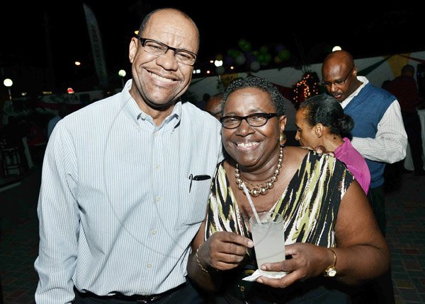 Rudolph Brown/Photographer
Ian McNaughton pose with Marjorie Hyatt at the Credit Union Fund management Company Christmas party at the Spanish Court Hotel in New Kingston on Friday, December 13, 2013