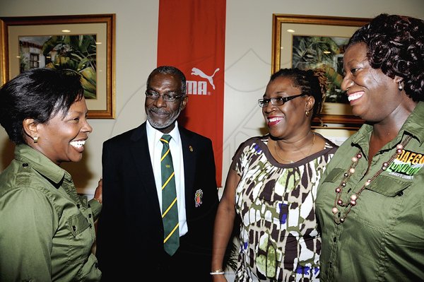 Winston Sill/Freelance Photographer
Nordia Craig (left), the Gleaner Company's advertising-operations manager; chats with Don Anderson, first vice president, Jamaica Olympic Association; main presenter Carole Beckford (second right), sports management specialist; and Jenni Campbell, Gleaner Company managing editor, during yesterday's launch of  the Gleaner's Daegu to London, Jamaica's  Journey campaign, at The Knutsford Court Hotel in St Andrew.