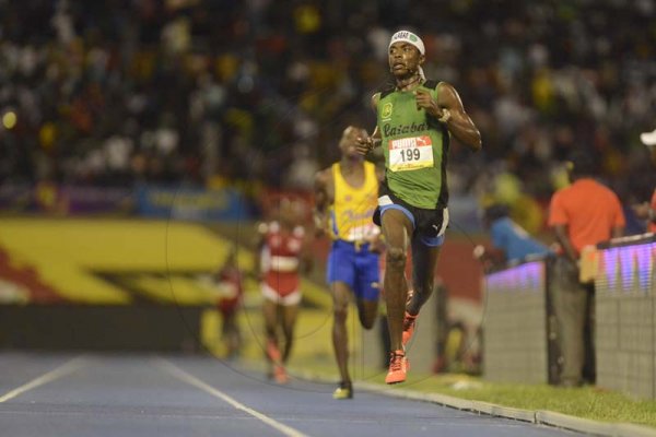 Shorn Hector/Photographer Kevroy Venson of Calabar wins the boy's 5000 meter open on day five of the ISSA/GraceKennedy Boys and Girls’ Athletics Championships held at the The National Stadium in Kingston on Saturday March 30, 2019