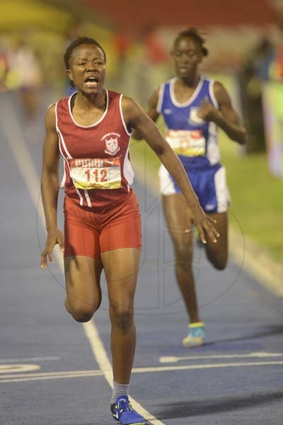 Shorn Hector/Photographer Amani Cooke of Campionn College wins her section of the girl's Heptathlon 800 meter run on day five of the ISSA/GraceKennedy Boys and Girls’ Athletics Championships held at the The National Stadium in Kingston on Saturday March 30, 2019