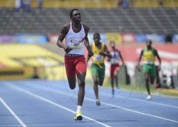 Shorn Hector/Photographer Derick Grant of Ferncourt wins heat one in the oys class three 400 meter semifinal on day four of the ISSA/GraceKennedy Boys and Girls’ Athletics Championships held at the The National Stadium in Kingston on Friday March 29, 2019