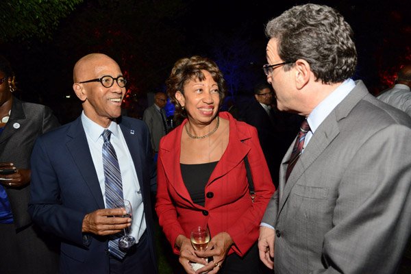 Rudolph Brown/ Photographer
Business Desk
Joseph Matalon, (right) chairman ICD Group Limited and Chairman DBJ chat with Diane Edwards President of Jampro and Milverton Reynolds, managing director Develoment Bank of Jamaica at the Development Bank of Jamaica's Venture Capital official Opening and Cocktail Reception at the Jamaica Pegasus on Monday, March 7, 2016