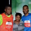 Winston Sill/Freelance Photographer
Digicel Foundation 5K Run/Walk for Special Needs, held on the Waterfront, Downtown Kingston on Saturday night  October 11, 2014. Here are Benjamin Simms (left), of Digicel; Karesha Allen (centre), CPJ Wines Brand Associate; and Aston Aiken (right).