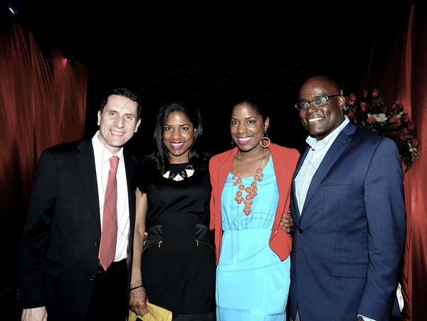 Winston Sill / Freelance Photographer
Digicel launch 4G Service. held at Victoria Pier, Ocean Boulevard on Monday night June 25,. 2012. Here are Jason Corrigan (left); Kenisha Linton (second left); Keneea Linton-George (second right); and Brian George (right).