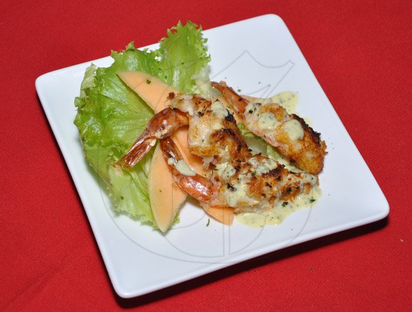 Jermaine Barnaby/Photographer
The Gleaner's Pre-Restaurant Week Dinner Promotions 2013 with Karin Cooper and guests at  Red Bones on Tuesday, November 5, 2013. Appetizer Baked shrimp stuffed with a salted codfish pate.