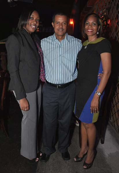 Jermaine Barnaby/Photographer
Robin Williams (center) poses with guest Fashaya Johnson (left) and Simone Mahabeer at The Gleaner's Pre-Restaurant Week Dinner Promotions 2013 with Karin Cooper and guests at  Red Bones on 
 Tuesday, November 5, 2013.