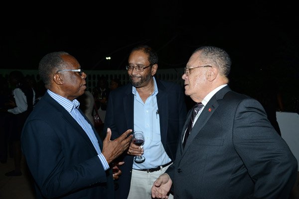 Winston Sill/Freelance Photographer
Minister of  Foreign Affairs and Foreign Trade Arnold J Nicholson host Diplomatic Week Reception, held at the Jamaica Pegasus Hotel, New Kingston on Monday night February 3, 2014. Here are Karl James (left); Howard Mitchell (centre); and Arnold Foote Jr. (right).